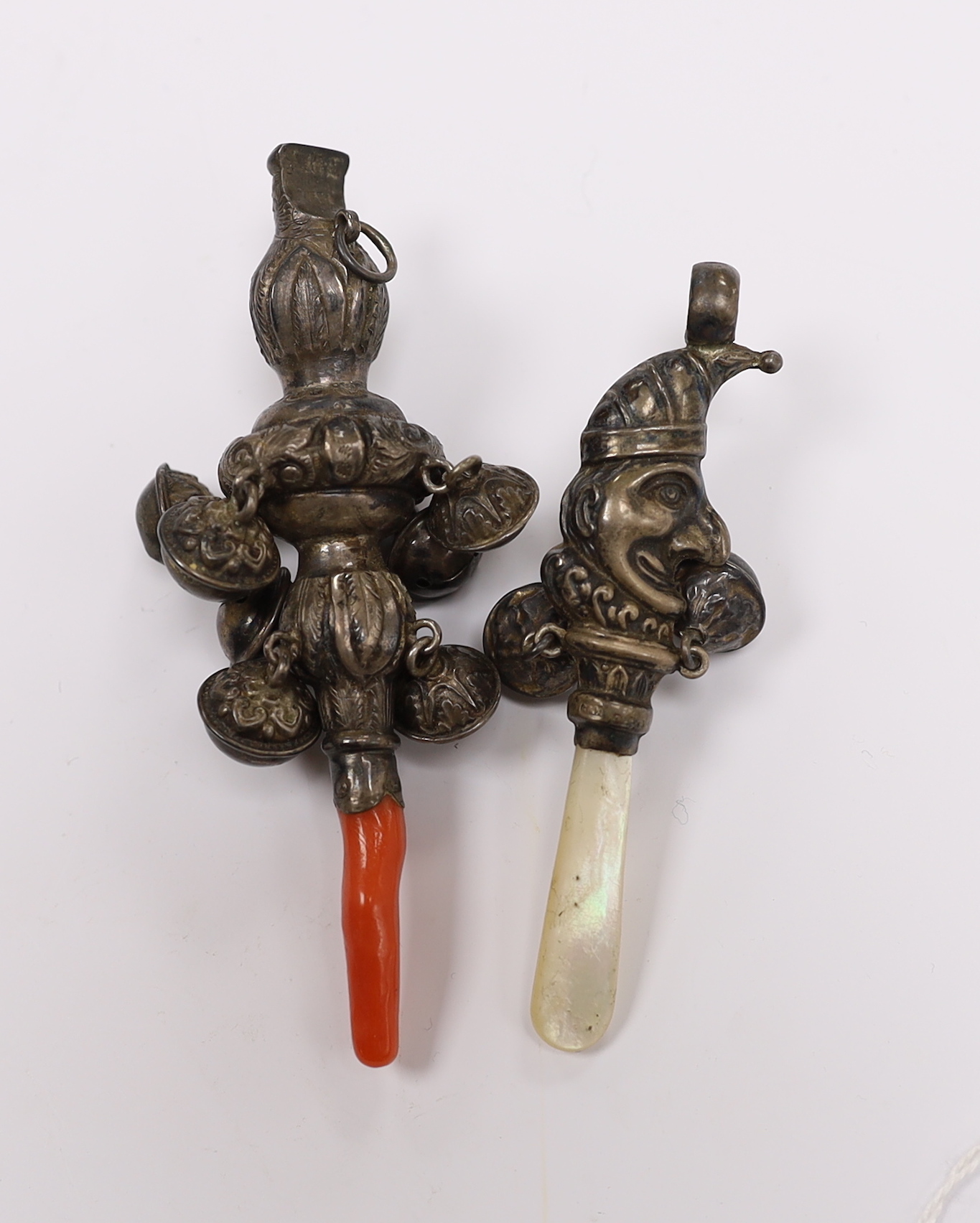 Two child's silver rattles, including George V Mr Punch, with mother of pearl teether, by Crisford & Norris, 86mm.